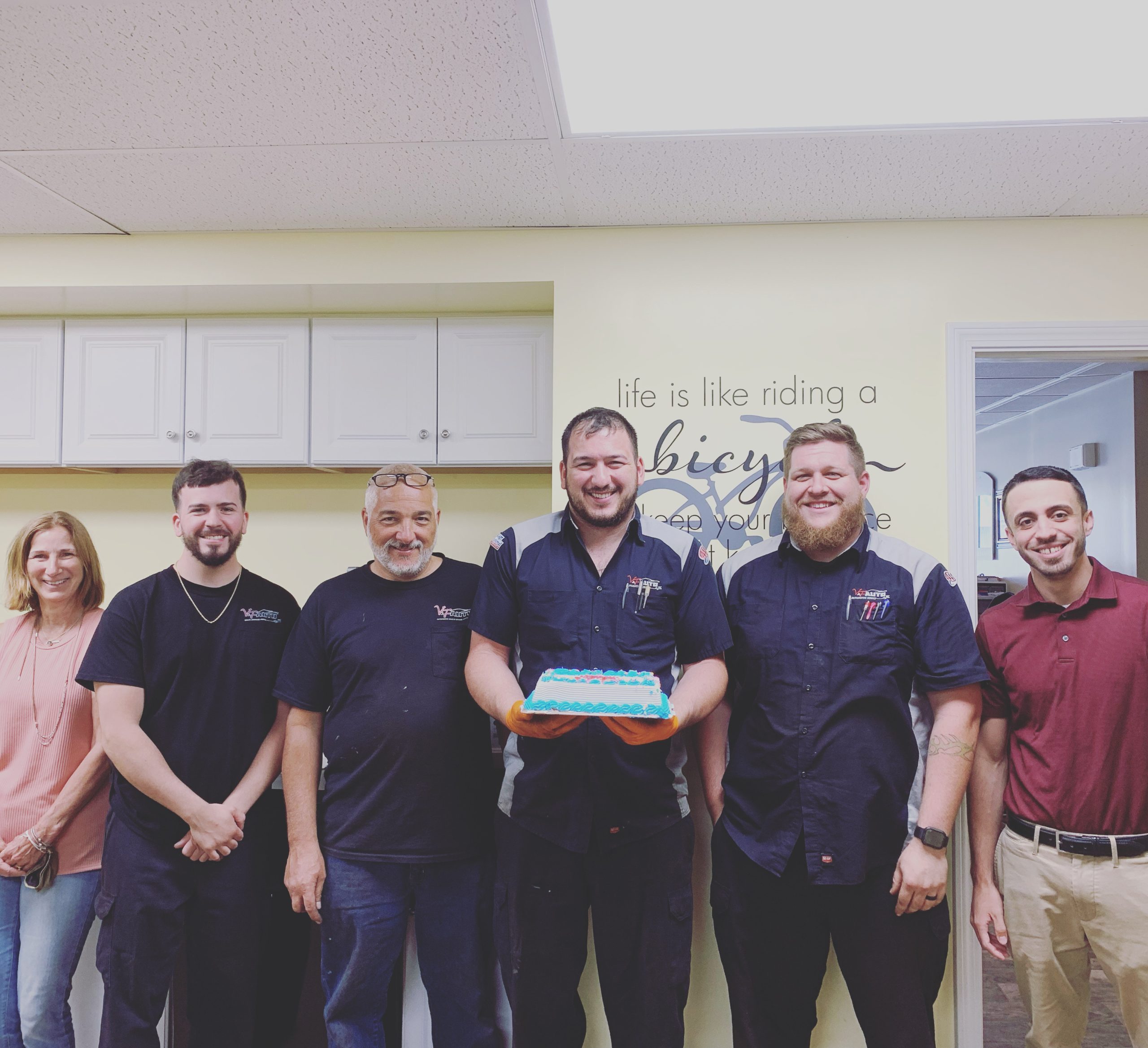 Happy team members at V&F